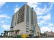 Upscale condos with stylish architectural details, a parking garage, and lush landscaping at 2301 S Ocean Blvd. # 1408, North Myrtle Beach, SC 29582