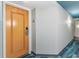 Condo hallway entrance featuring unit number 1408, accent wall, and decorative lighting at 2301 S Ocean Blvd. # 1408, North Myrtle Beach, SC 29582