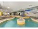 Fun indoor pool area with a lazy river and splash pad for Gathering entertainment and relaxation at 2301 S Ocean Blvd. # 1408, North Myrtle Beach, SC 29582