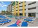 Relaxing outdoor pool featuring lounge chairs, umbrellas, and easy access to the building at 2301 S Ocean Blvd. # 1408, North Myrtle Beach, SC 29582