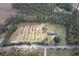 Aerial view showing house, orchard, and surrounding land at 4575 Saints Delight Rd., Georgetown, SC 29440