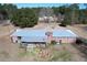 Aerial view of house with large backyard and metal roof at 4575 Saints Delight Rd., Georgetown, SC 29440