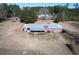 Aerial view of a ranch-style home on a large lot with mature trees at 4575 Saints Delight Rd., Georgetown, SC 29440