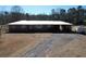 Ranch style home with a large yard and a long driveway at 4575 Saints Delight Rd., Georgetown, SC 29440
