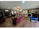 Living room with hardwood floors, fireplace, and comfortable furniture at 4575 Saints Delight Rd., Georgetown, SC 29440