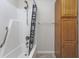 Bathroom includes a shower/tub combo and linen cabinet at 6703 Jefferson Pl. # B2, Myrtle Beach, SC 29572