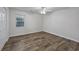 Spacious bedroom with wood-look floors and double closets at 6703 Jefferson Pl. # B2, Myrtle Beach, SC 29572