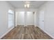 Bedroom with double closets and wood-look floors at 6703 Jefferson Pl. # B2, Myrtle Beach, SC 29572