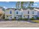 Three-unit townhouse building with parking and landscaping at 6703 Jefferson Pl. # B2, Myrtle Beach, SC 29572