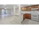 Open kitchen with granite counters and wood cabinets at 6703 Jefferson Pl. # B2, Myrtle Beach, SC 29572