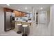 Virtually staged kitchen with granite counters and stainless steel appliances at 6703 Jefferson Pl. # B2, Myrtle Beach, SC 29572