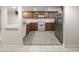 Kitchen with granite counters and wood cabinets at 6703 Jefferson Pl. # B2, Myrtle Beach, SC 29572