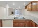 Kitchen with granite island and stainless steel appliances at 6703 Jefferson Pl. # B2, Myrtle Beach, SC 29572