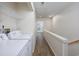 Stackable washer and dryer in a laundry closet with shelving at 6703 Jefferson Pl. # B2, Myrtle Beach, SC 29572