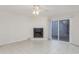 Living room features a fireplace and sliding glass door to patio at 6703 Jefferson Pl. # B2, Myrtle Beach, SC 29572