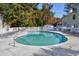 Community pool with lounge chairs and surrounding fence at 6703 Jefferson Pl. # B2, Myrtle Beach, SC 29572