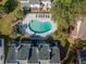 Aerial view of community pool with surrounding lounge chairs at 6703 Jefferson Pl. # B2, Myrtle Beach, SC 29572
