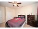 Bedroom with full-size bed, dresser, and ceiling fan at 101 Hartwell Dr., Little River, SC 29566