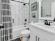 Clean bathroom with white cabinets and marble-tiled shower at 6001 - 1778 S Kings Hwy., Myrtle Beach, SC 29575