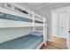 Cozy bedroom with a bunk bed and access to a hallway at 6001 - 1778 S Kings Hwy., Myrtle Beach, SC 29575