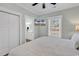 King-size bed in bright bedroom with wood floors and en-suite bath at 6001 - 1778 S Kings Hwy., Myrtle Beach, SC 29575