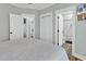 King-size bed in bright bedroom with wood floors and en-suite bath at 6001 - 1778 S Kings Hwy., Myrtle Beach, SC 29575