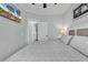 King-size bed in bright bedroom with wood floors and en-suite bath at 6001 - 1778 S Kings Hwy., Myrtle Beach, SC 29575