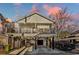 Elevated home with deck, carport, and modern design at 6001 - 1778 S Kings Hwy., Myrtle Beach, SC 29575