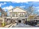 Two-story home with elevated deck and carport; modern design at 6001 - 1778 S Kings Hwy., Myrtle Beach, SC 29575