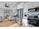 Modern kitchen with stainless steel appliances and white cabinets at 6001 - 1778 S Kings Hwy., Myrtle Beach, SC 29575