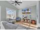 Sunlit living room featuring a cozy sectional sofa and hardwood floors at 6001 - 1778 S Kings Hwy., Myrtle Beach, SC 29575