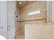 Large walk-in shower with built-in bench and glass enclosure at 8030 Wacobee Dr., Myrtle Beach, SC 29579