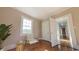 Bedroom with wood floors, chair, and natural light at 2110 4Th Ave., Conway, SC 29527