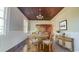 Dining room with wood table, wood floors, and stylish decor at 2110 4Th Ave., Conway, SC 29527
