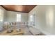 Bright living room featuring a comfortable sofa, ottoman, and decorative rug at 2110 4Th Ave., Conway, SC 29527