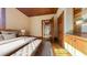 Serene bedroom with a wood ceiling, neutral color scheme, and hardwood floors at 2110 4Th Ave., Conway, SC 29527