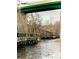 The river features a boardwalk and the green of a bridge is seen above at 2110 4Th Ave., Conway, SC 29527