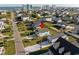Aerial view of a beach house in a residential area at 243 Calhoun Dr., Garden City Beach, SC 29576