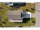 Top-down view of beach house, highlighting deck and driveway at 243 Calhoun Dr., Garden City Beach, SC 29576