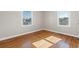Neutral bedroom with hardwood floors and plenty of natural light at 243 Calhoun Dr., Garden City Beach, SC 29576