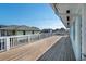 Deck with white railings and views of the neighborhood at 243 Calhoun Dr., Garden City Beach, SC 29576