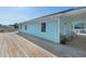 Long deck offering expansive views of the surrounding area at 243 Calhoun Dr., Garden City Beach, SC 29576