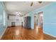 Bright dining area with hardwood floors and view of the kitchen at 243 Calhoun Dr., Garden City Beach, SC 29576