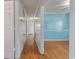 Bright hallway with hardwood floors and light walls at 243 Calhoun Dr., Garden City Beach, SC 29576