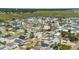 Aerial view of a residential area with colorful beach homes and roads near the marsh at 302A 32Nd Ave. N, North Myrtle Beach, SC 29582