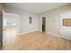 Bright bedroom has light wood floors and neutral walls, and includes an attached bathroom at 302A 32Nd Ave. N, North Myrtle Beach, SC 29582