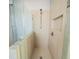 Modern shower with a glass partition and updated fixtures at 302A 32Nd Ave. N, North Myrtle Beach, SC 29582