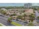 Aerial view of property, including buildings, pool, landscaping, and street at 6803 N Ocean Blvd. # 210, Myrtle Beach, SC 29572