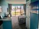 Cozy bedroom with a view of the pool area, featuring cheerful decor and ample light at 6803 N Ocean Blvd. # 210, Myrtle Beach, SC 29572