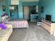 Open floor plan with sleeping and living area including kitchenette, storage, and television at 6803 N Ocean Blvd. # 210, Myrtle Beach, SC 29572